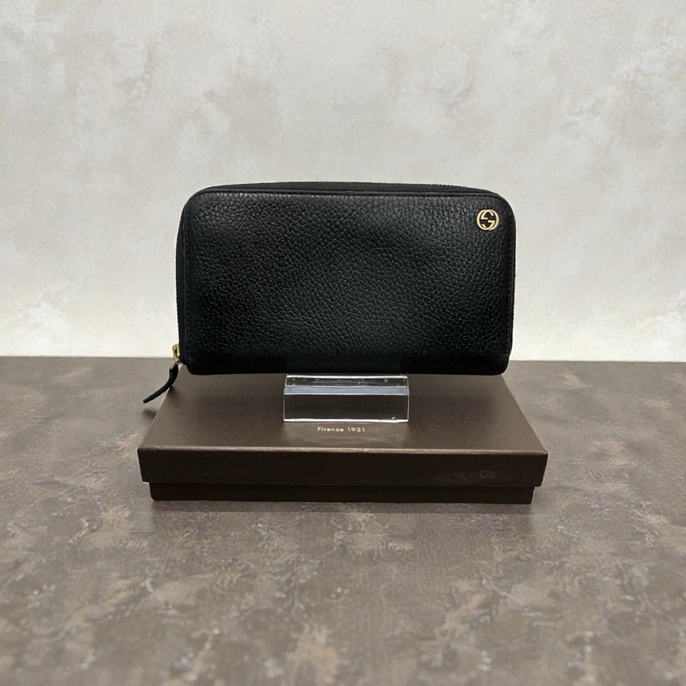 Gucci Black Pebbled Leather Zip Wallet with Gold Logo